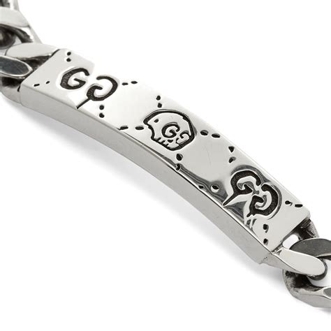 gucci ghost bracelet on wrist